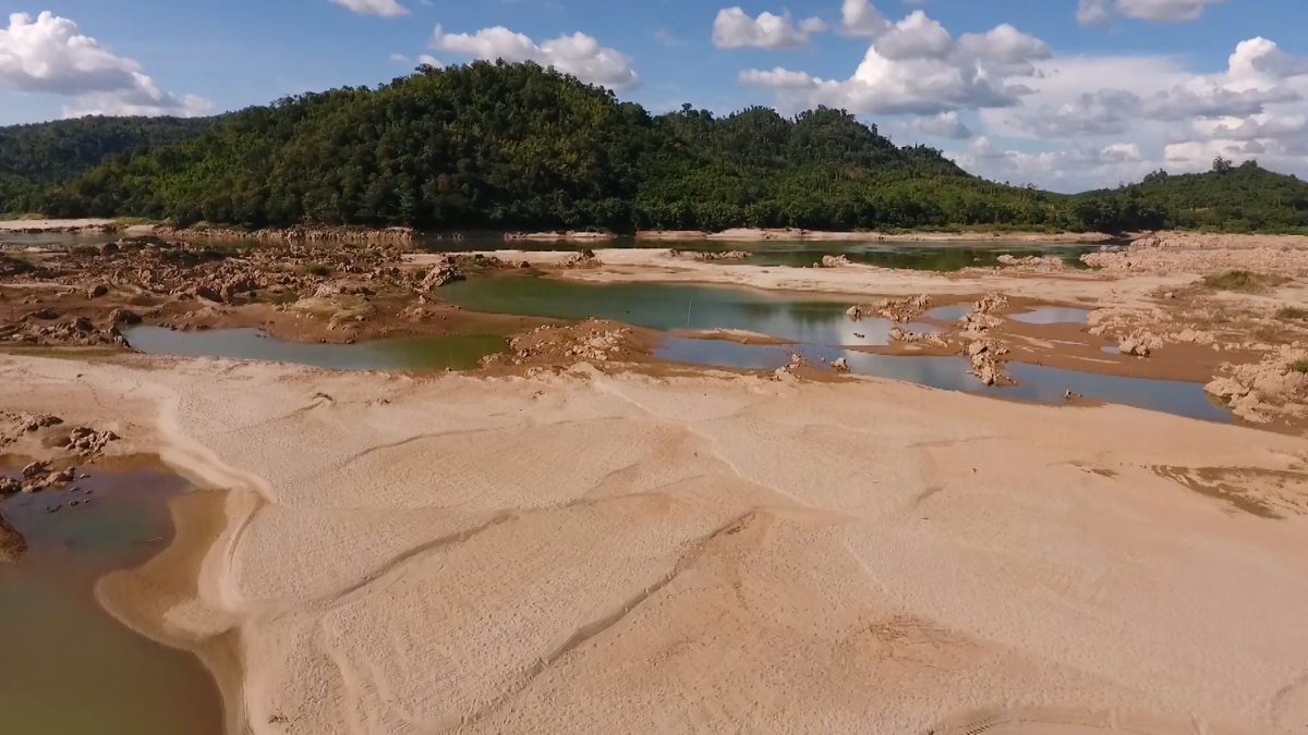This screengrab from an aerial video taken on October 28, 2019 shows the Mekong river in Sungkom district in Nong Khai province, more than 300km from the Xayaburi dam. (Getty)