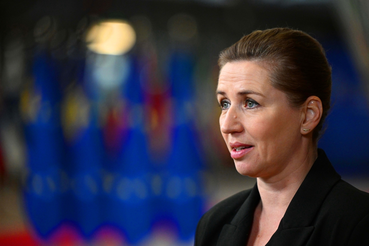Denmark's Prime Minister Mette Frederiksen talks to the media as she arrives at the European headquarters for the EU-Western Balkans summit, in Brussels, on December 14, 2023. 