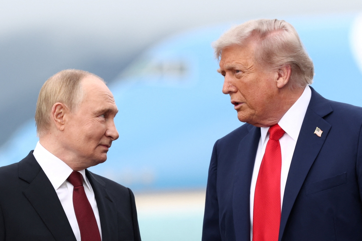 US President Donald Trump speaks with Russian President Vladimir Putin, as they meet to negotiate for an end to the war in Ukraine, at Joint Base Elmendorf-Richardson in Anchorage, Alaska, US, August 15, 2025. 