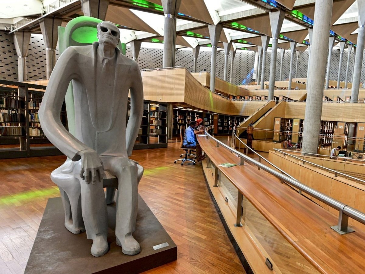 A photo taken on June 24, 2019, shows a huge statue of the late Egyptian writer Taha Hussein inside the Bibliotheca Alexandrina building.