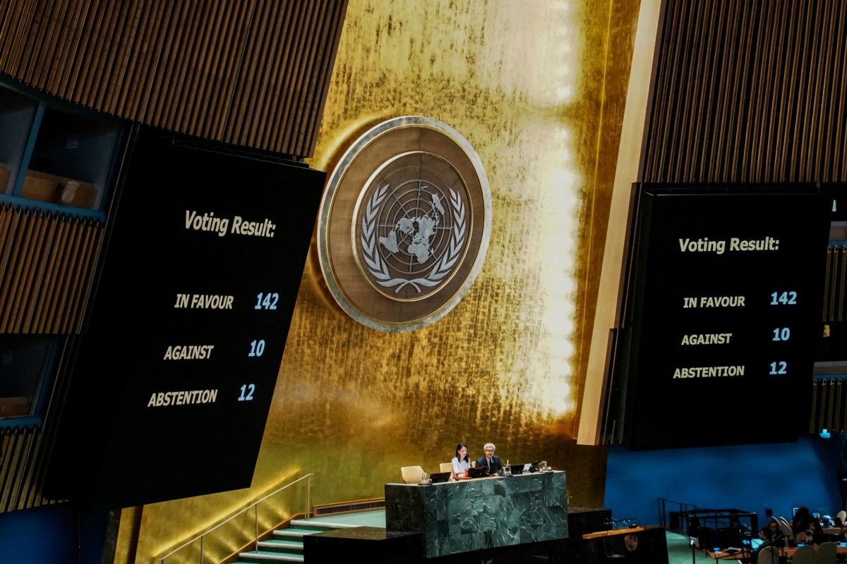 Screens show the number of votes as members of the United Nations General Assembly vote on the Palestinian issue and the implementation of the two-state solution, at the UN headquarters in New York on September 12, 2025.