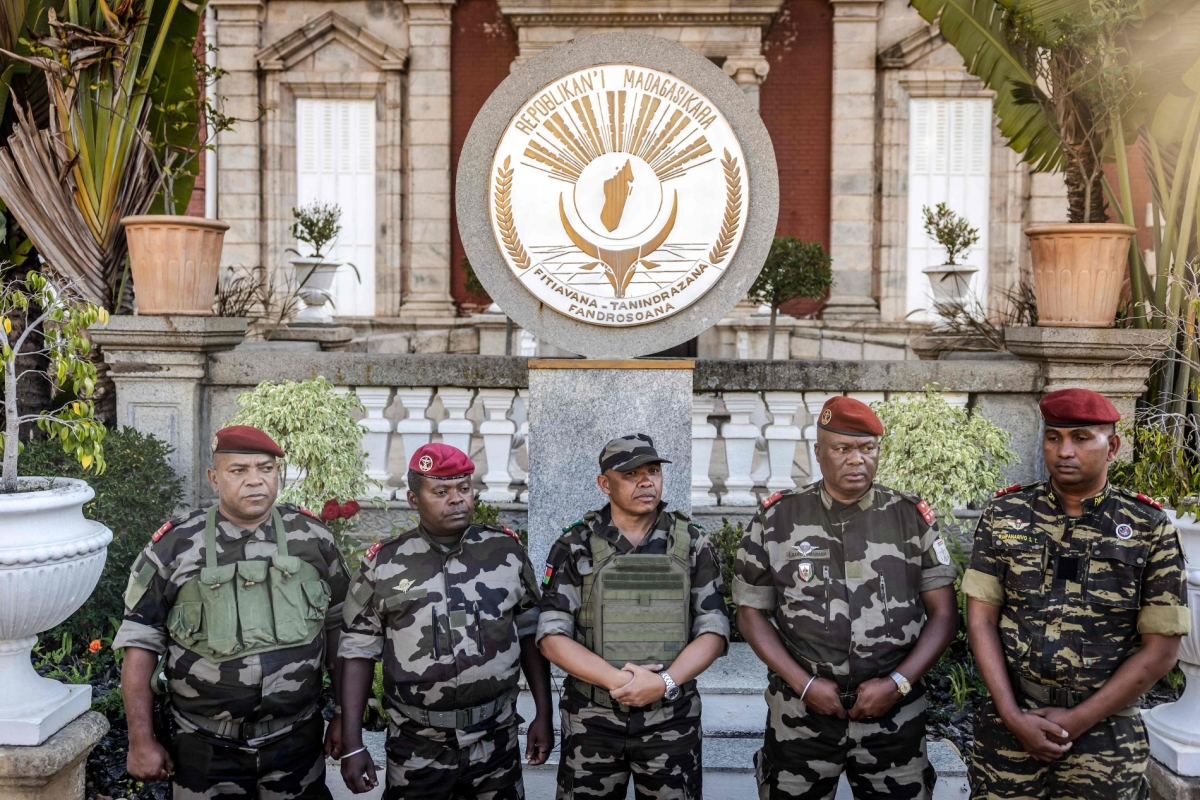 Malagasy Colonel Michael Randrianirina, head of the CAPSAT military unit, reads out a statement in front of the presidential palace, where he announces the army is taking power in Antananarivo on October 14, 2025.