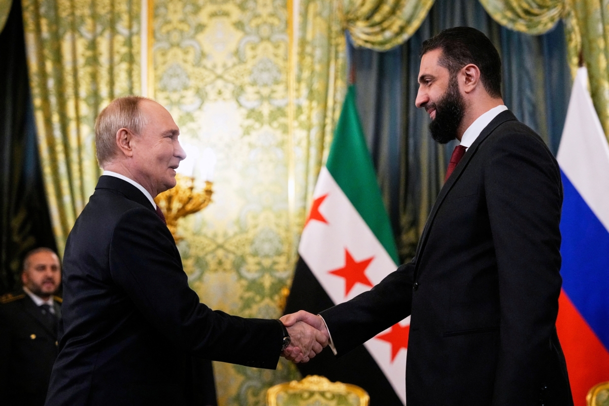 Russian President Vladimir Putin and Syrian interim president Ahmed al-Sharaa hold a meeting at the Grand Kremlin Palace in Moscow on October 15, 2025.