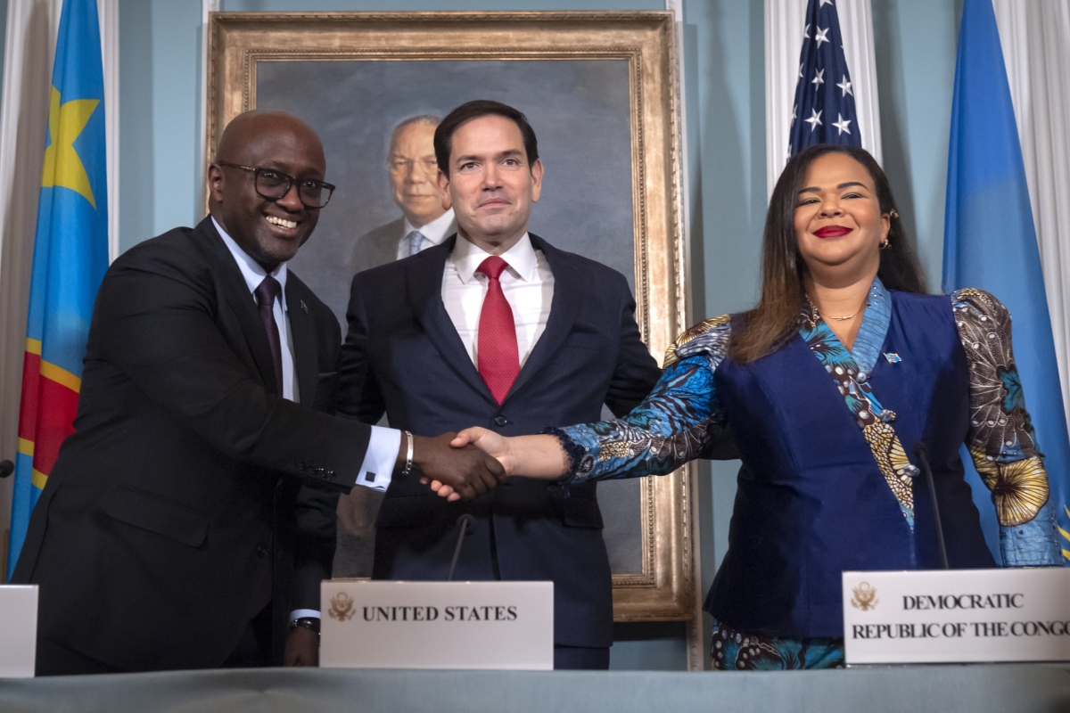 Secretary of State Marco Rubio stands with Rwanda's FM Olivier Nduhungirehe and Democratic Republic of Congo's FM Therese Kayikwamba Wagner, after signing a peace agreement in Washington on June 27, 2025.