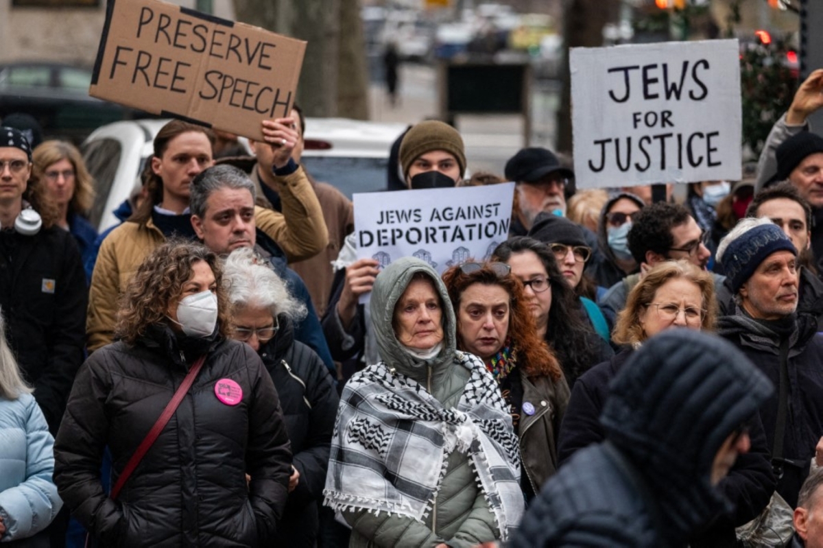 Activists hold a demonstration in lower Manhattan against the arrest by ICE of Palestinian activist Mahmoud Khalil, a graduate student at Columbia University, on 20 March 2025 in New York City.