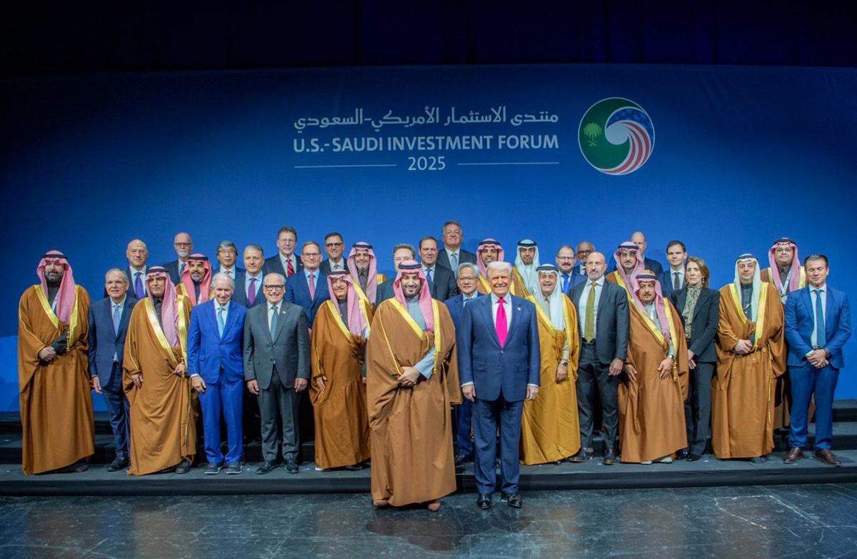 US President Donald Trump and Saudi Crown Prince Mohammed bin Salman stand with Tesla CEO Elon Musk, Nvidia CEO Jensen Huang and others at the Saudi-US Investment Forum in Washington, DC. on 19 November, 2025.
