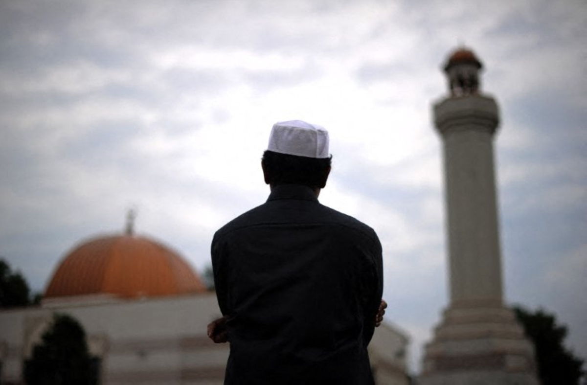 Picture for illustrative purposes only. A Muslim takes part in Eid-al-Fitr prayer marking the end of their holy fasting month of Ramadan, at a mosque in Silver Spring, Maryland, on 19 August, 2012.