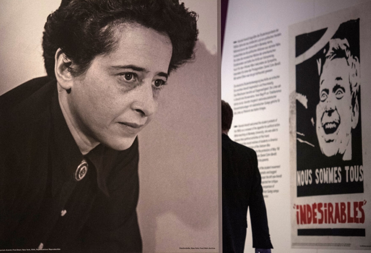 A visitor stands next to a photograph of German-American philosopher Hannah Arendt at the German Historical Museum in Berlin on 6 May 2020. 