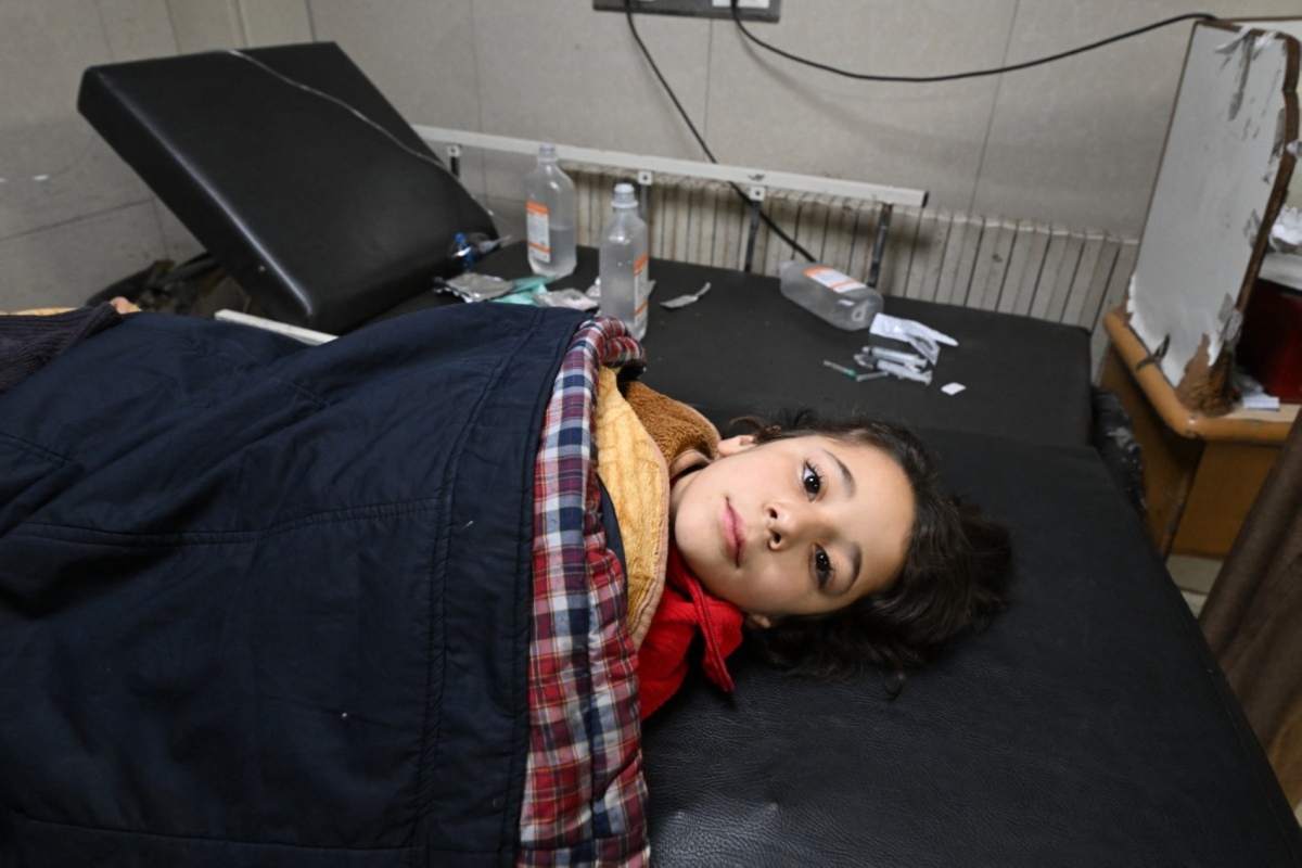A wounded girl lies on a hospital bed after an Israeli strike in the Syrian village of Beit Jin on 28 November 2025 killed 10 people, the deadliest Israeli attack since al-Assad&#039;s ouster in December 2024.