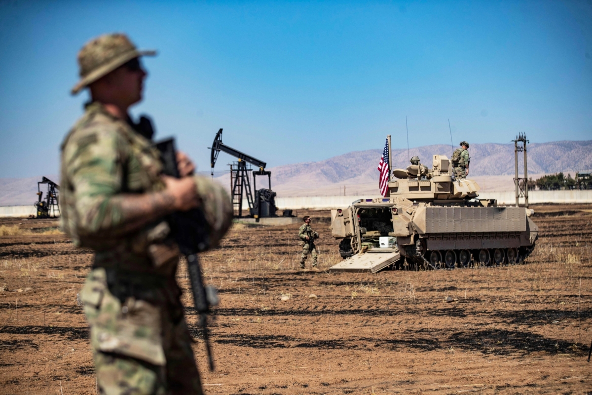 US forces patrol oil fields near Syria's north-east in the Qahtaniyah countryside of Hasakeh province on 3 September 2024.
