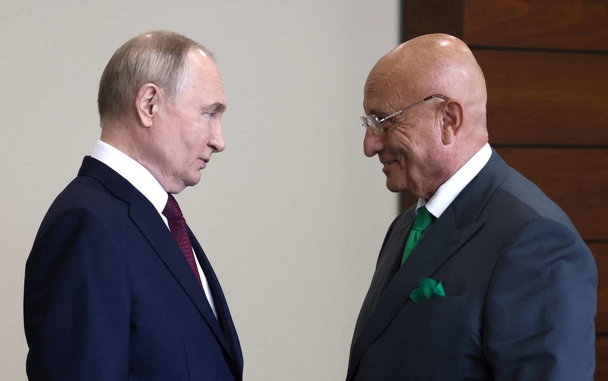 Russian President Vladimir Putin speaks to Prof. Sergei Karaganov before a plenary session of the St. Petersburg International Economic Forum on 7 June 2024.