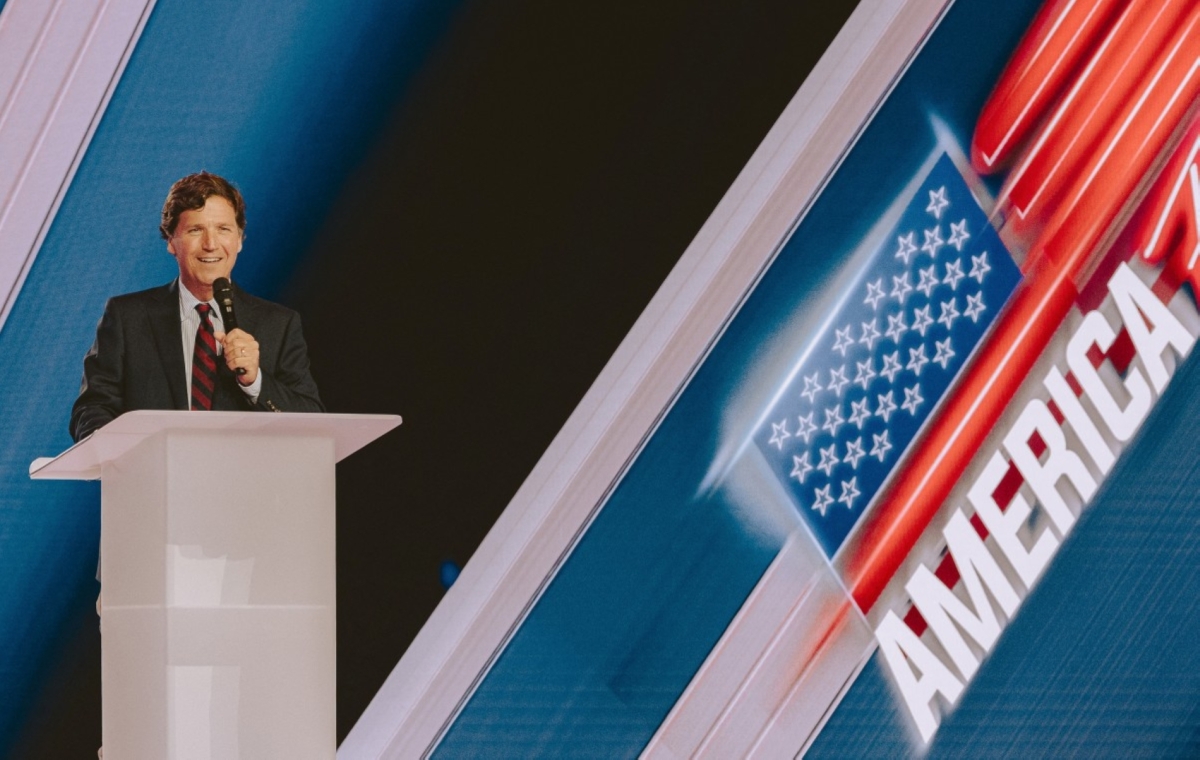 Conservative political commentator and podcast host Tucker Carlson speaks at Turning Point's annual AmericaFest conference, in remembrance of late right-wing political activist Charlie Kirk, in Phoenix, Arizona, on 18 December 2025.