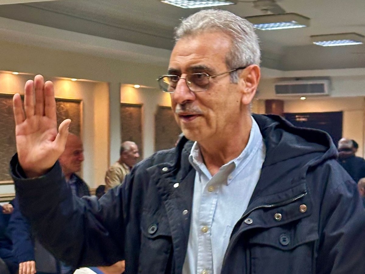 Ali Shaath, head of the Palestinian technocratic committee for managing the Gaza Strip, offers condolences to a Palestinian family in Cairo on 15 January 2026. 