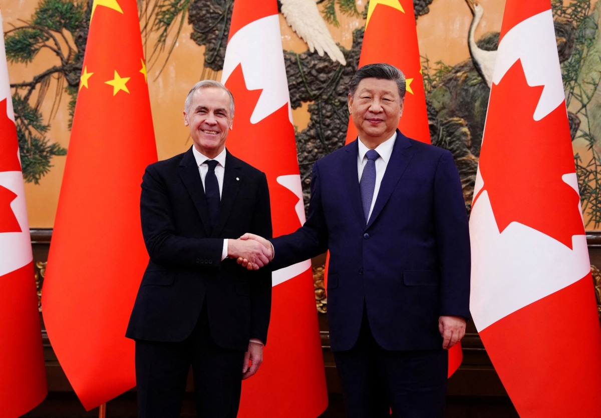 Canadian Prime Minister Mark Carney shakes hands with President of China Xi Jinping at the Great Hall of the People in Beijing, China, on Friday, 16 January 2026.