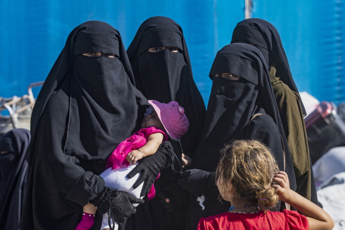 Released detainees prepare to leave the Kurdish-run al-Hol camp, which holds relatives of suspected Islamic State (IS) group fighters in Syria's northeastern Hasakeh governorate on 3 September 2023.