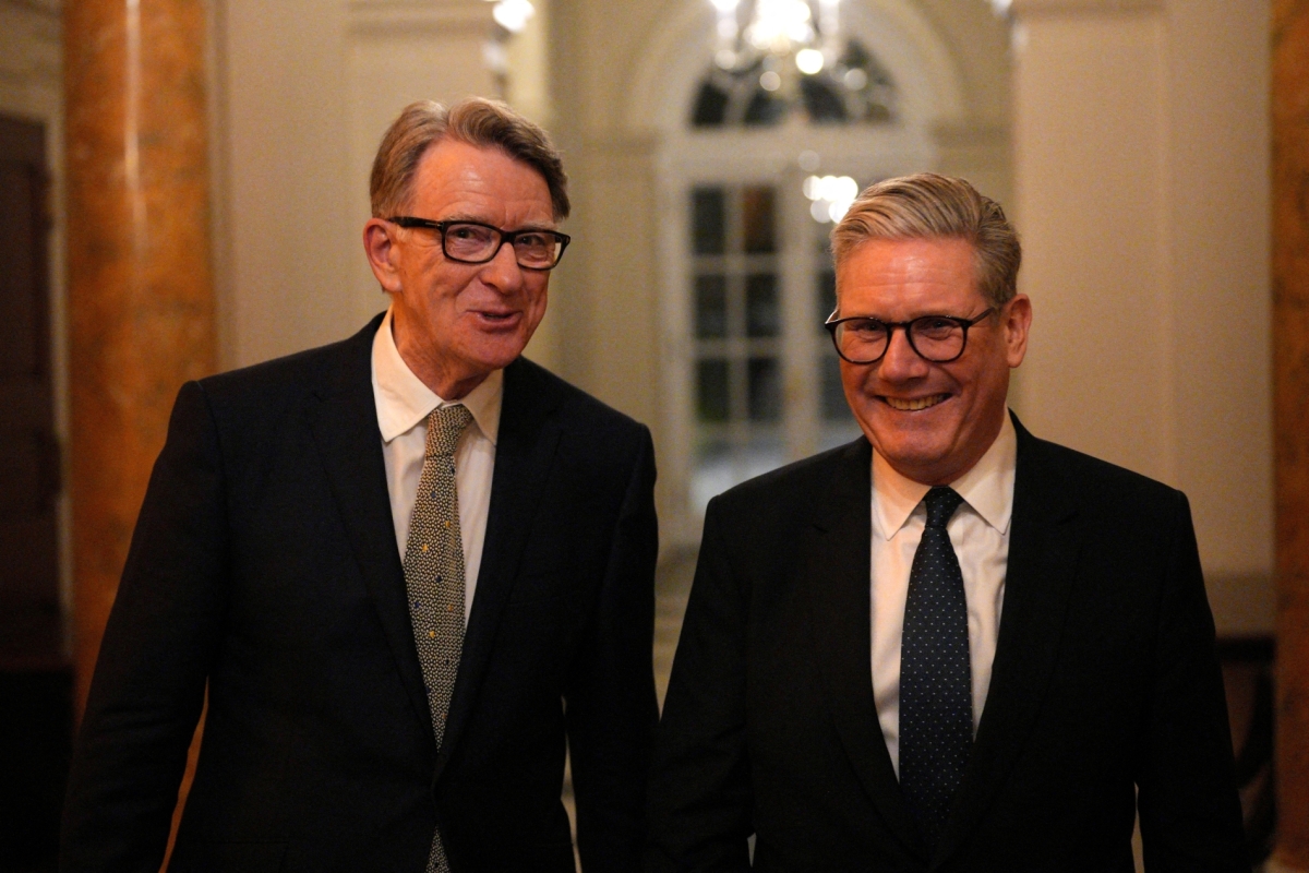 UK Prime Minister Keir Starmer talks with UK ambassador to the United States Peter Mandelson during a welcome reception at the ambassador's residence on 26 February 2025, in Washington, DC.