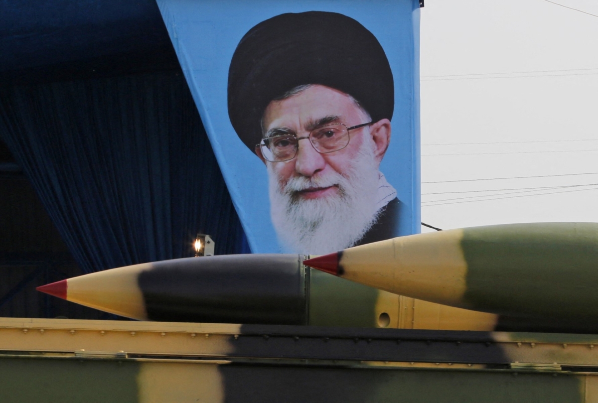 An Iranian military truck carries surface-to-air missiles past a portrait of Iran's Supreme Leader Ayatollah Ali Khamenei during a parade on the occasion of the country's annual army day on 18 April 2018, in Tehran.