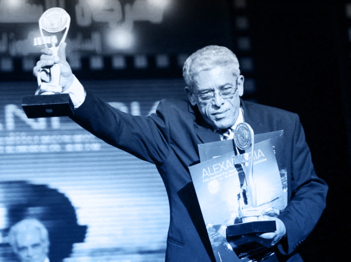 Egyptian director Daoud Abdel Sayed holds two awards during the opening ceremony of the Alexandria Film Festival for Mediterranean Countries in the Egyptian port city of Alexandria, late on 14 September 2010.