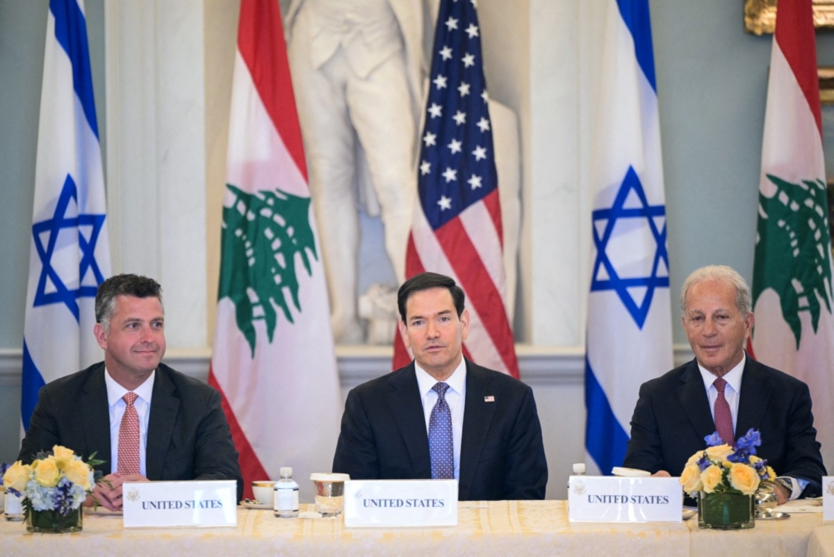 US Secretary of State Marco Rubio (C), alongside US State Department Counselor Michael Needham (L) and US Ambassador to Lebanon Michel Issa (R) at the State Department in Washington, DC, on 14 April 2026.