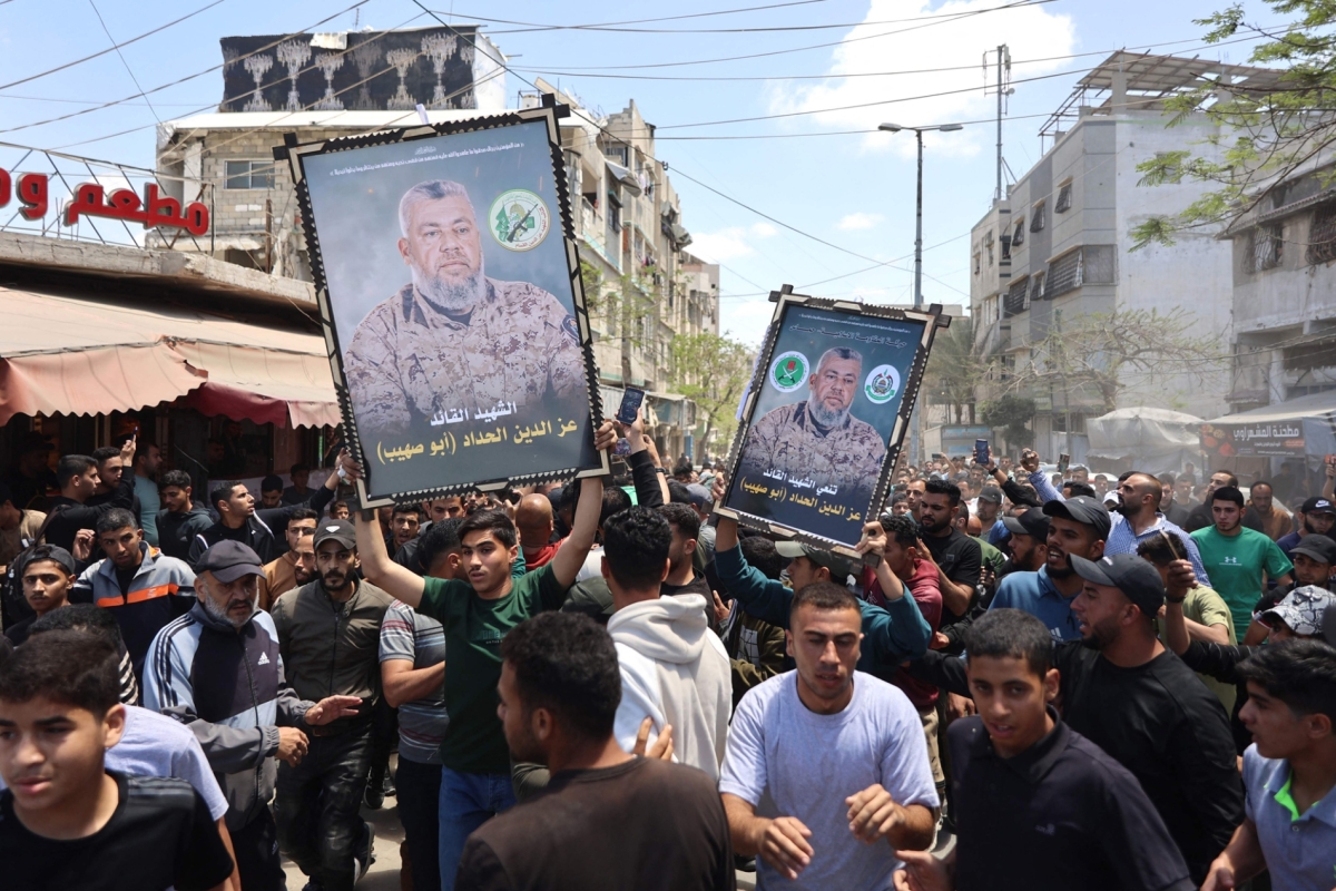 The funeral procession for Izz al-Din al-Haddad, a military commander of the Qassam Brigades, along with his wife and daughter, took place in Gaza City on 16 May 2026.