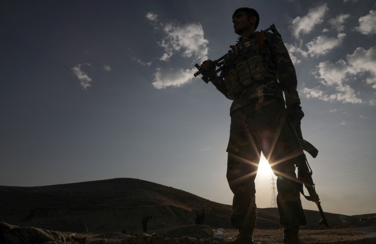 A Kurdish Peshmerga fighter affiliated with Iran's separatist Kurdistan Freedom Party (PAK), mans a position north of Kirkuk, in Iraq's autonomous Kurdistan region.