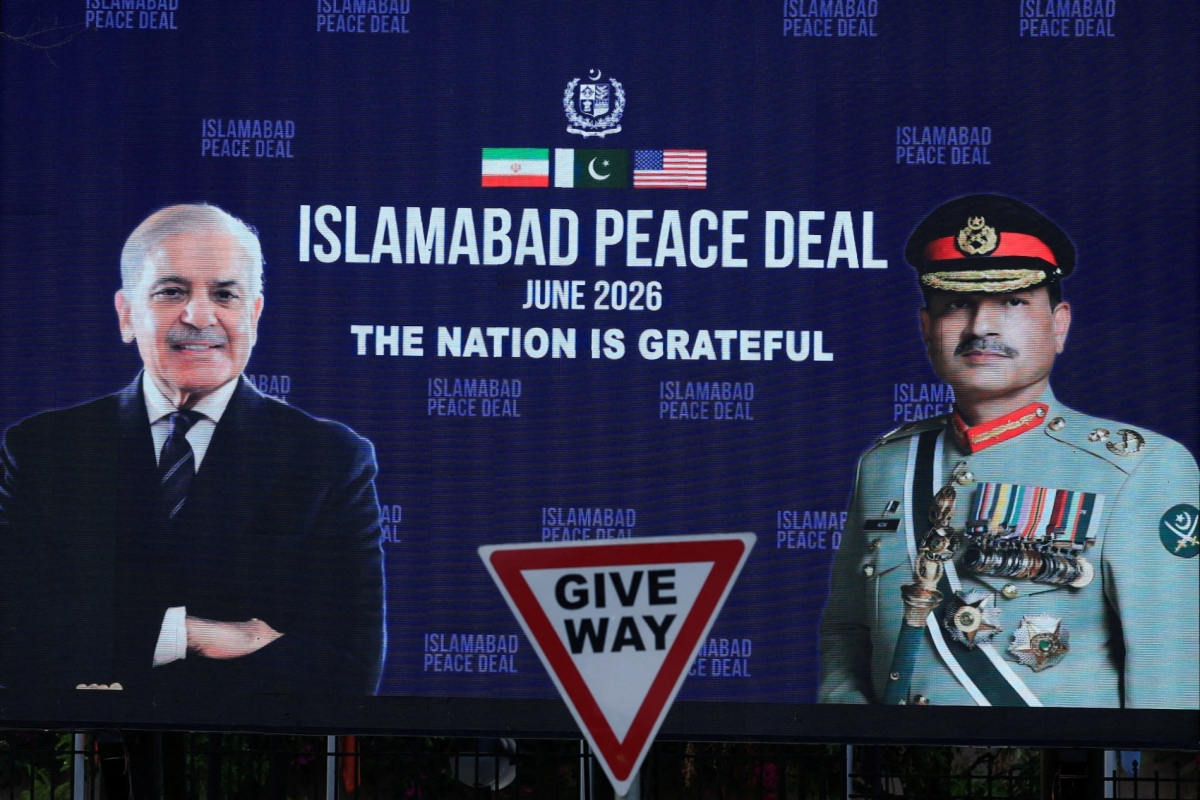 A roadside billboard displaying portraits of Pakistan's Chief of Army Staff Field Marshal Asim Munir and Prime Minister Shehbaz Sharif, following a deal between the US and Iran, in Islamabad, Pakistan, on 16 June 2026.
