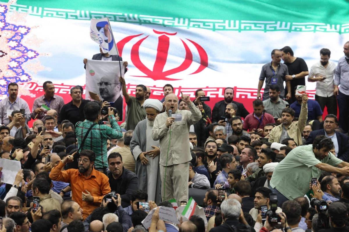 Iran's conservative Parliament Speaker Mohammad Bagher Ghalibaf addresses supporters in the Iranian capital, Tehran, on June 26, 2024, during his election campaign ahead of a presidential vote to replace the late president.
