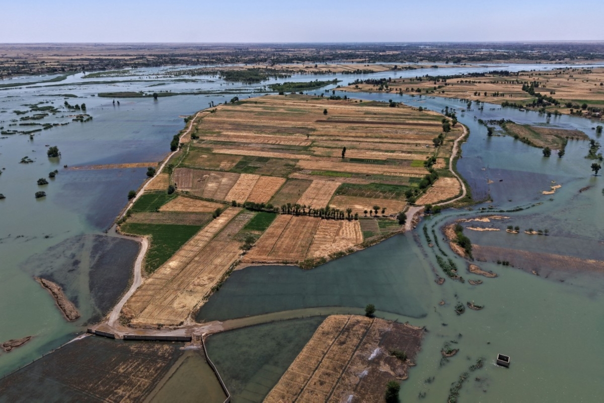 This aerial photograph shows an inundated area in Syria's Deir ez-Zor province on 31 May 2026, following recent flooding as water levels from the Euphrates River rise.