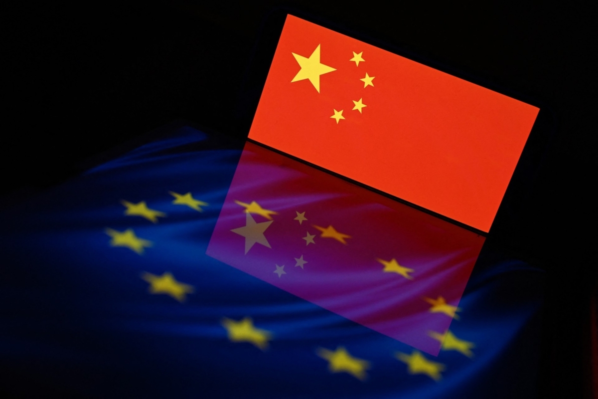 This illustration photograph shows the flags of the European Union and China displayed on screens in Brussels on 2 June 2026.