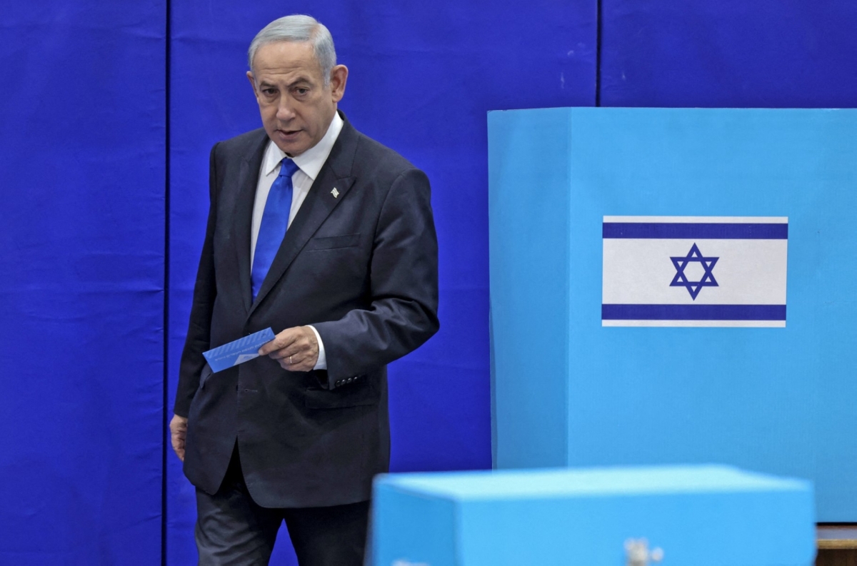 Likud chairman Benjamin Netanyahu casts his ballot at a polling station in Jerusalem in the country's fifth election in less than four years on 1 November 2022.