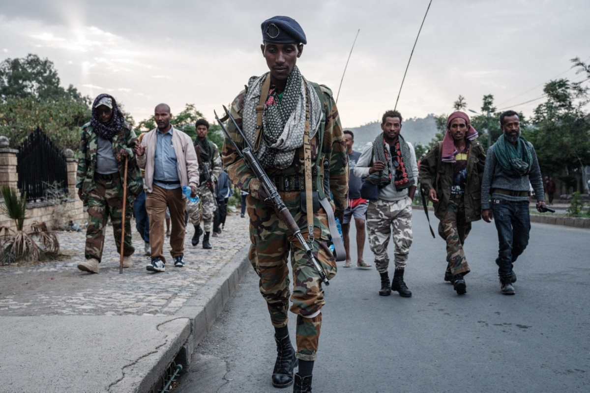 Tigray People's Liberation Front (TPLF) fighters arrive after eight hours of walking in Mekele, the capital of the Tigray region, Ethiopia, on 29 June 2021. 
