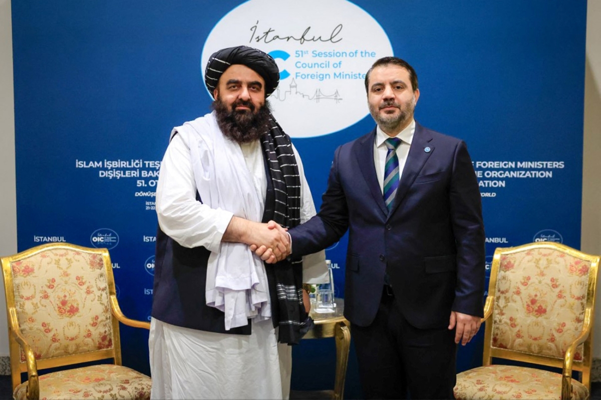 Syria's foreign minister, Asaad al-Shaibani, meets with Taliban foreign minister, Amir Khan Muttaqi, on the sidelines of an OIC meeting in Istanbul on 21 June 2025.
