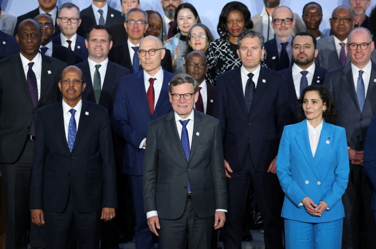 African Union, EU, and German officials pose for a family photo during the third international conference on Sudan, at the Foreign Office in Berlin on 15 April 2026.