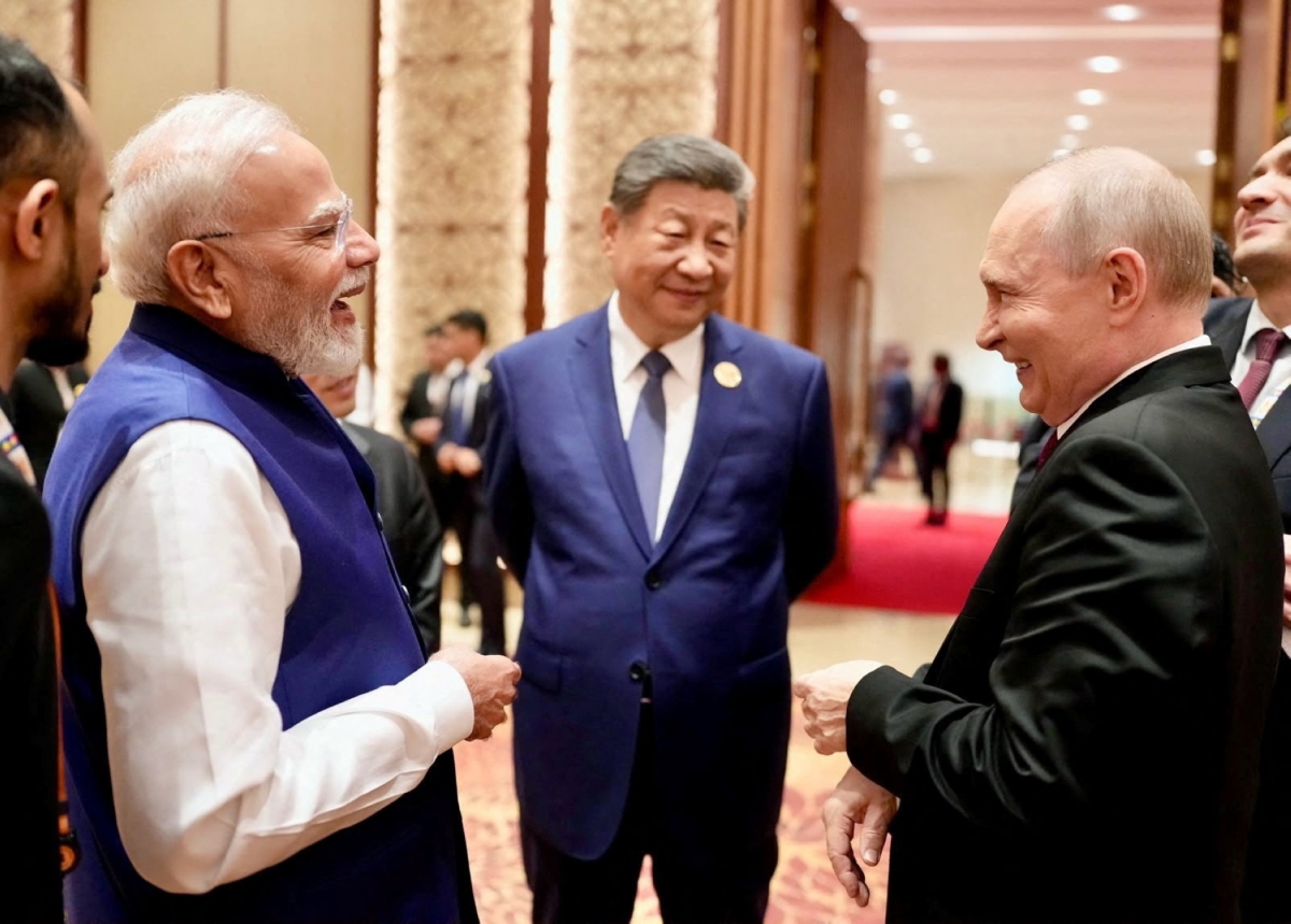 India's Prime Minister Narendra Modi shares a moment with Russian President Vladimir Putin as Chinese President Xi Jinping looks on during day two of the BRICS Summit in New Delhi, India, on 13 September 2026.