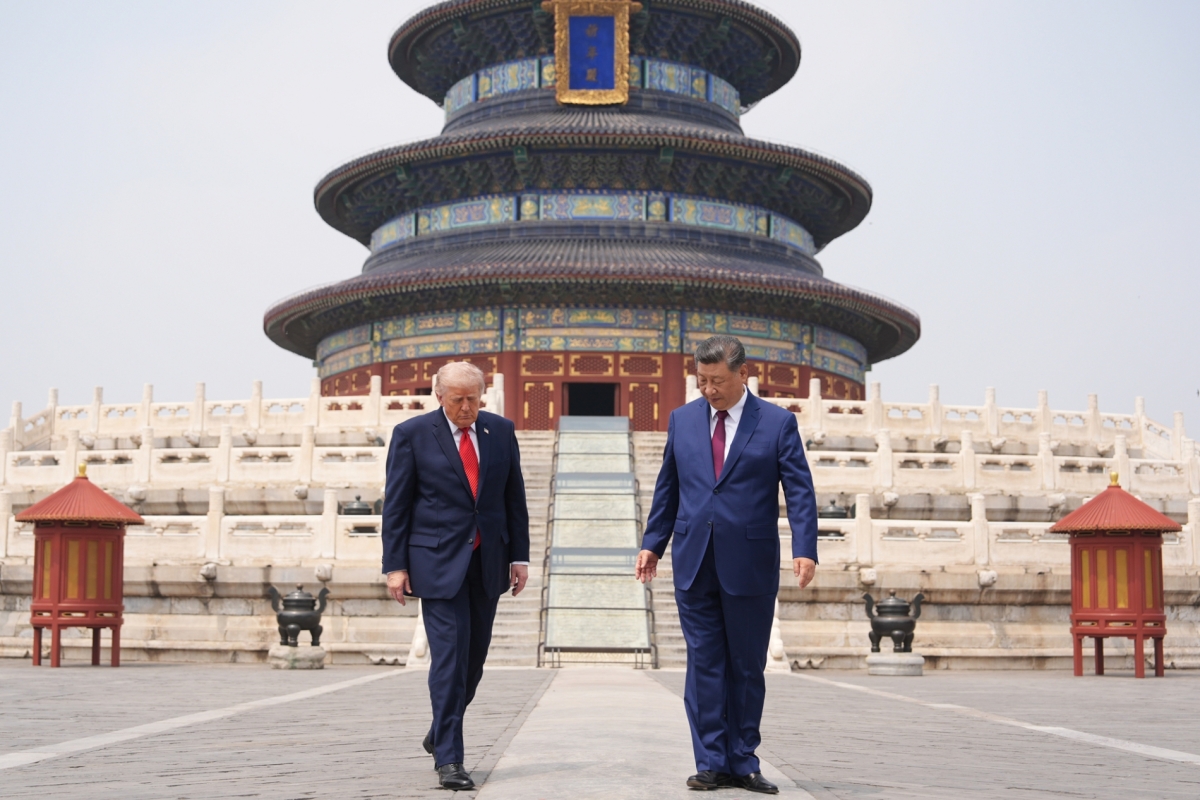 Donald Trump walks alongside Xi Jinping at the Temple of Heaven in Beijing, on 14 May 2026.
 