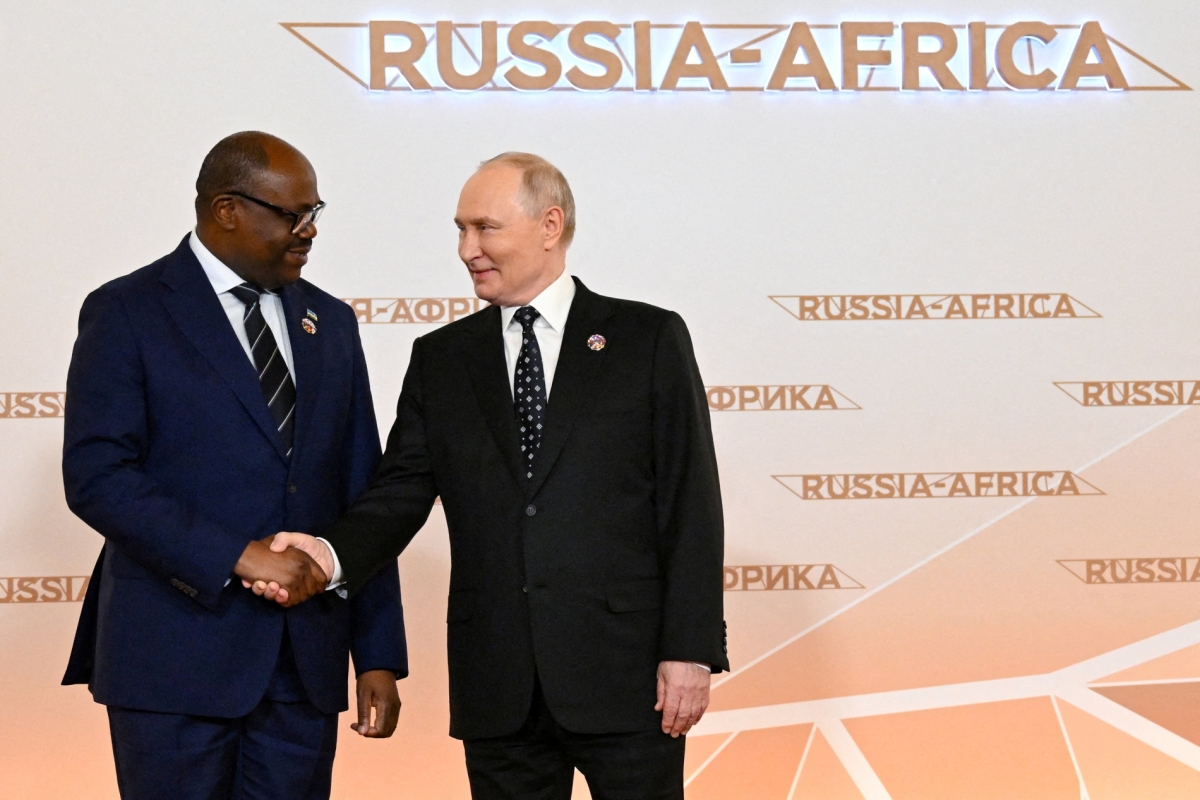 Russian President Vladimir Putin greets Rwanda's Prime Minister Justin Nsengiyumva during a welcoming ceremony for participants of the Russia-Africa Summit in Moscow, Russia, on 28 October 2026.