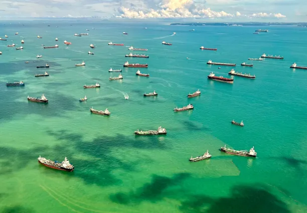 Cargo ships docked along the strait in Singapore on April 7, 2025.