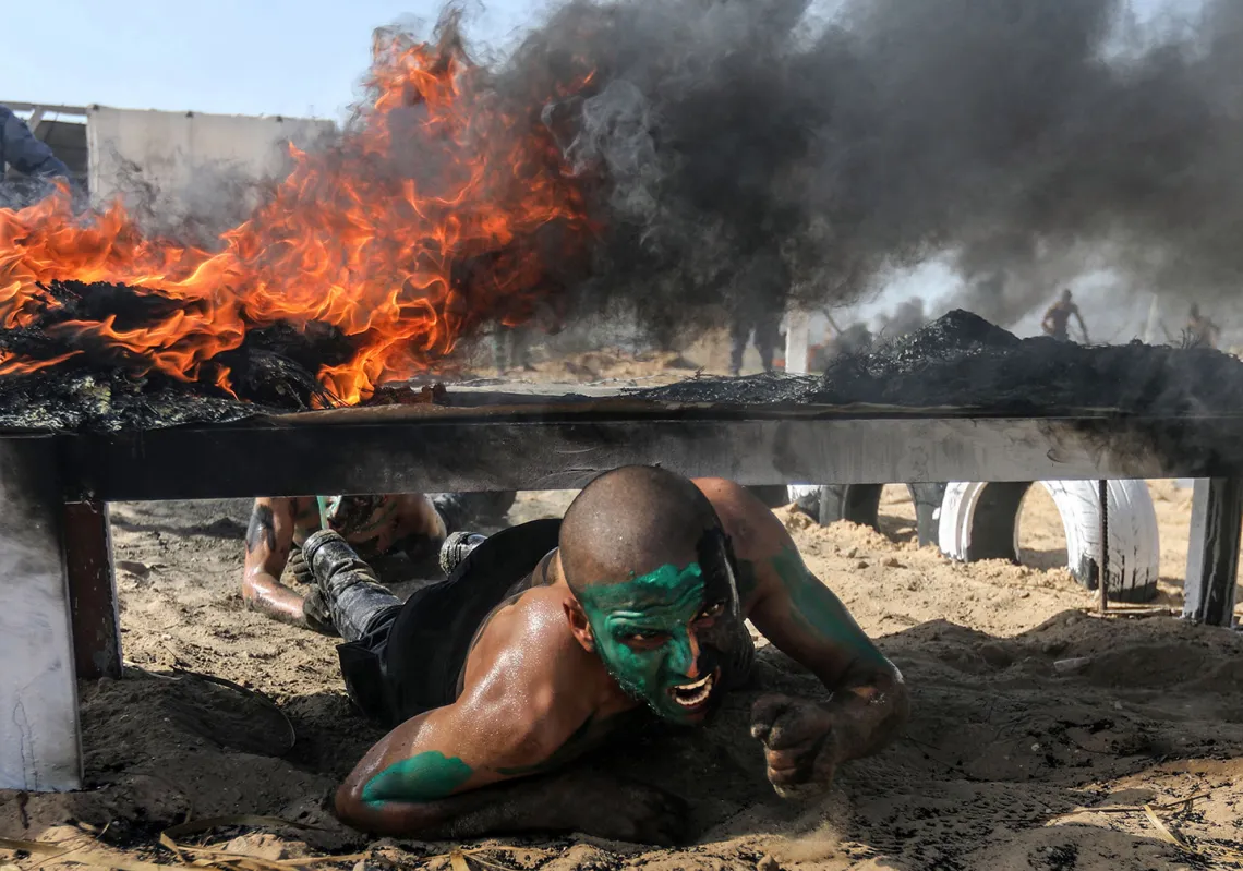 Palestinian police cadets take part in a training session at a police academy in Khan Yunis, in the southern Gaza Strip. (Getty)