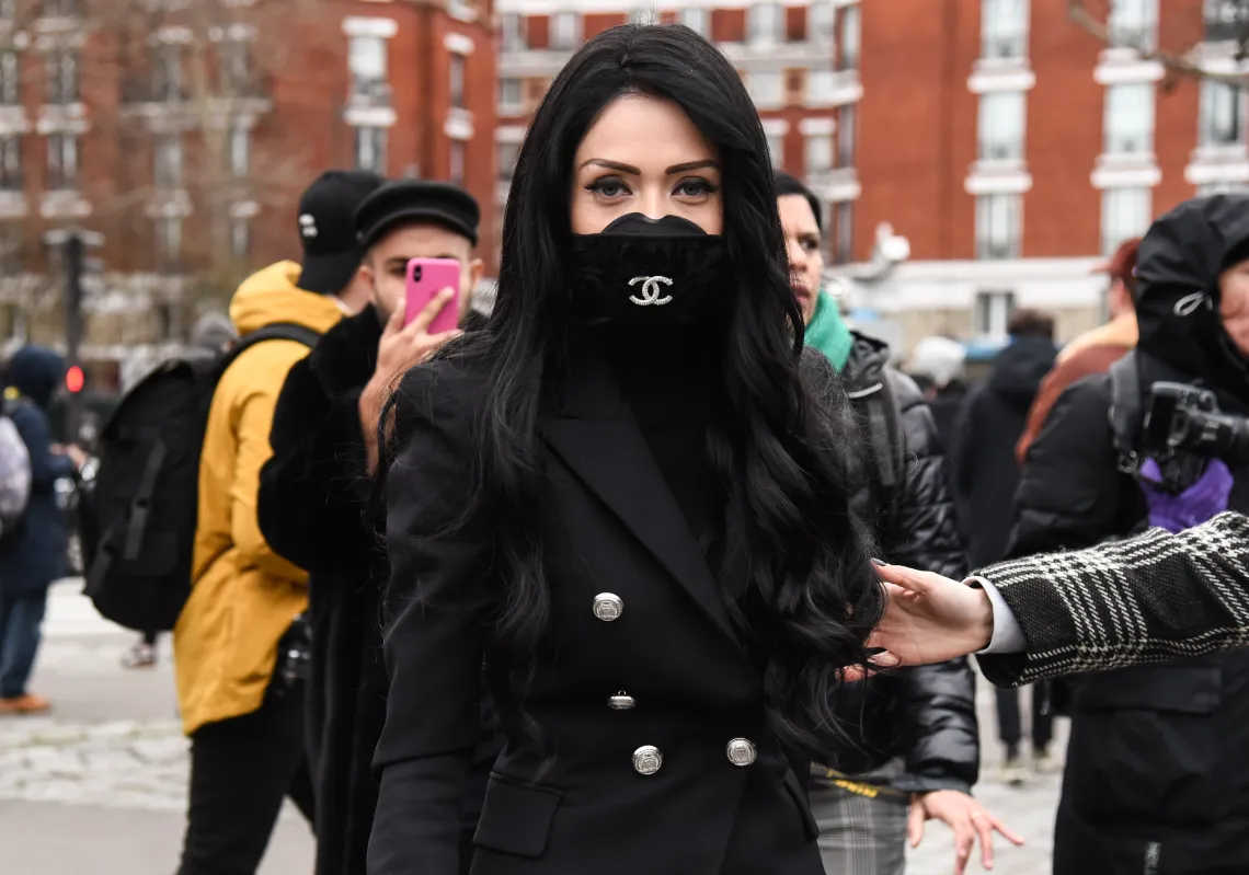 A guest is seen wearing a Chanel mask outside the Balmain show during Paris Fashion Week: AW20 on February 28, 2020 in Paris, France. (Getty)