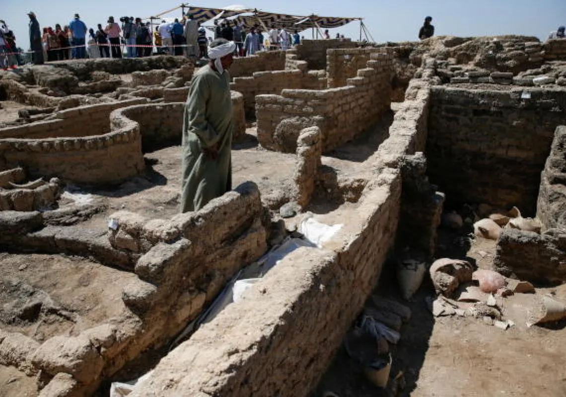 A man stands at the site of the 'Lost Golden City', which was recently discovered by archaeologists, in the West Bank of Luxor, Upper Egypt.(Reuters)