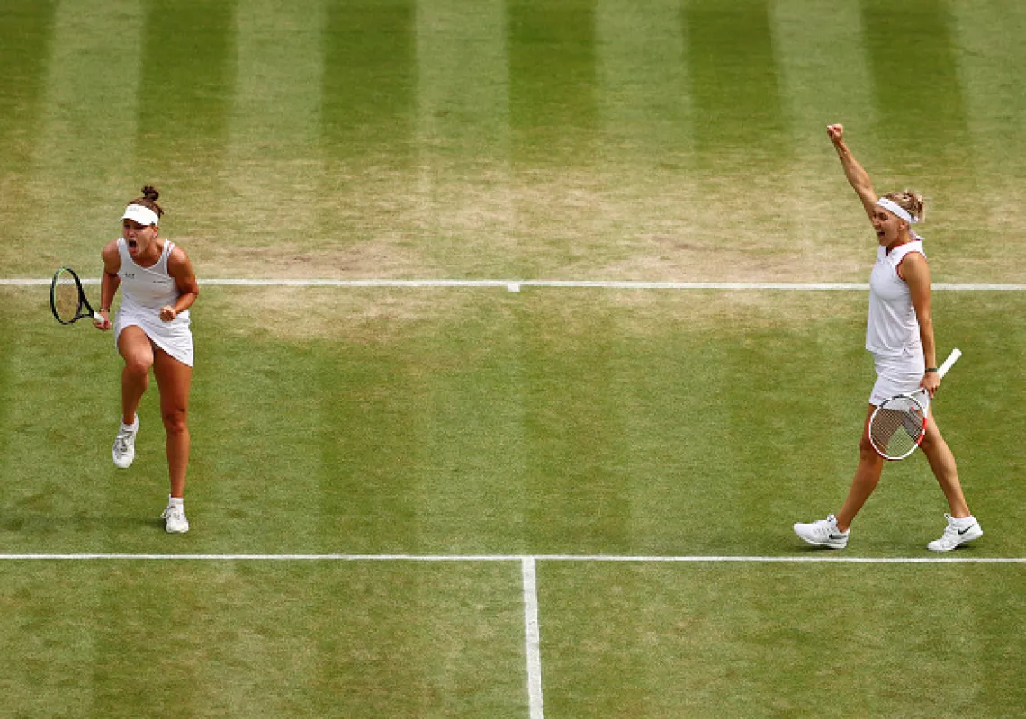 Veronika Kudermetova of Russia and playing partner Elena Vesnina of Russia celebrate in their Ladies' Doubles Semi-Final match against Caroline Dolehide of The United States and Storm Sanders of Australia during Day Eleven of The Championships - Wimbledon 2021 at All England Lawn Tennis and Croquet Club on July 09, 2021 in London, England. (Photo by Julian Finney/Getty Images)