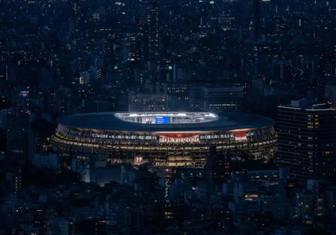 The Olympic Stadium is seen from Shibuya Sky observation deck in Tokyo on August 1, 2021. (Photo by Philip FONG / AFP)