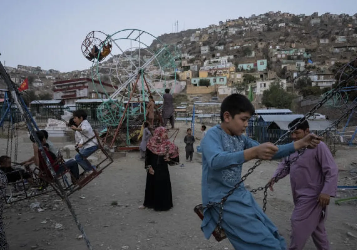 Children play at a park in Kabul, Afghanistan, Friday, Sept. 10, 2021. (AP Photo/Bernat Armangue)