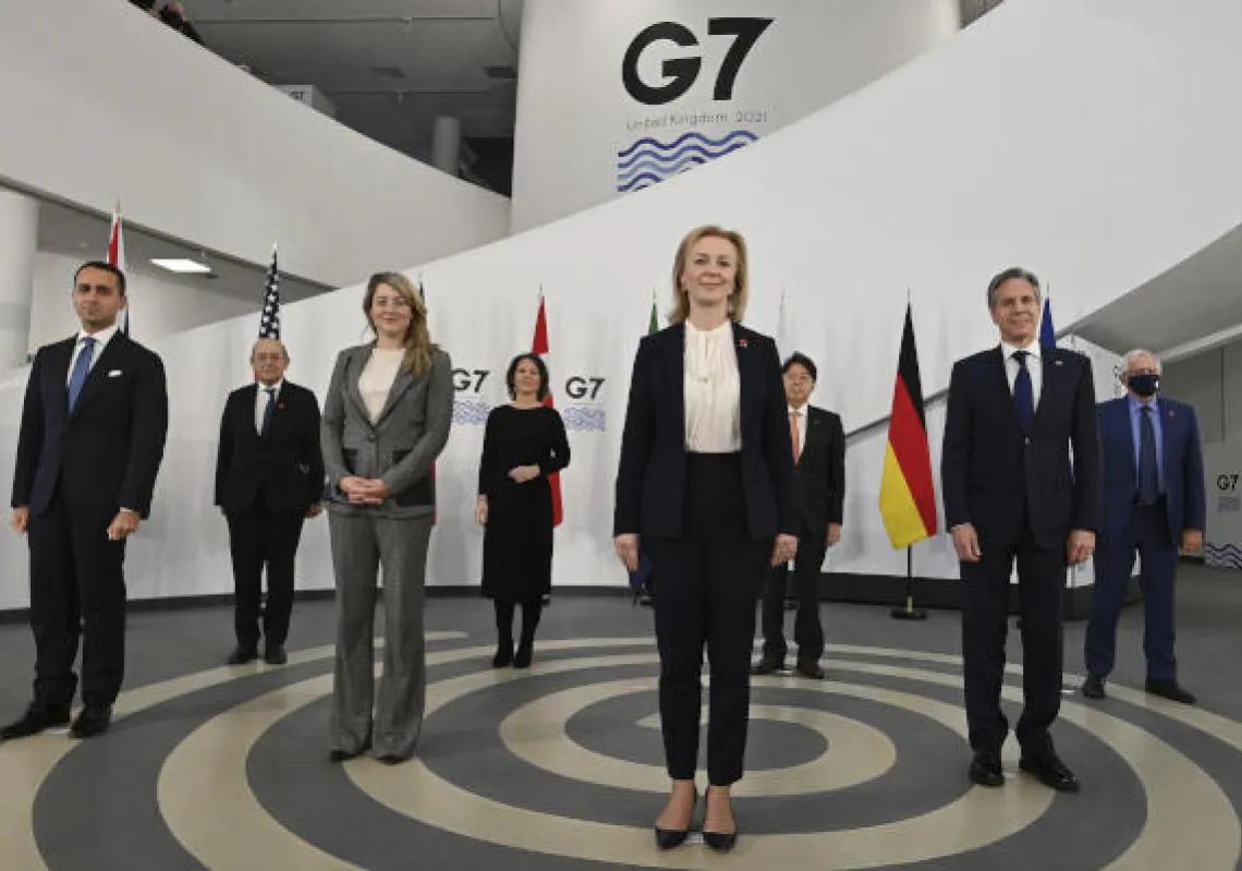G7 foreign ministers, pose in a socially distanced manner for a group photo at the Museum of Liverpool, Liverpool, England, Saturday Dec. 11, 2021. (Paul Ellis/Pool via AP)
