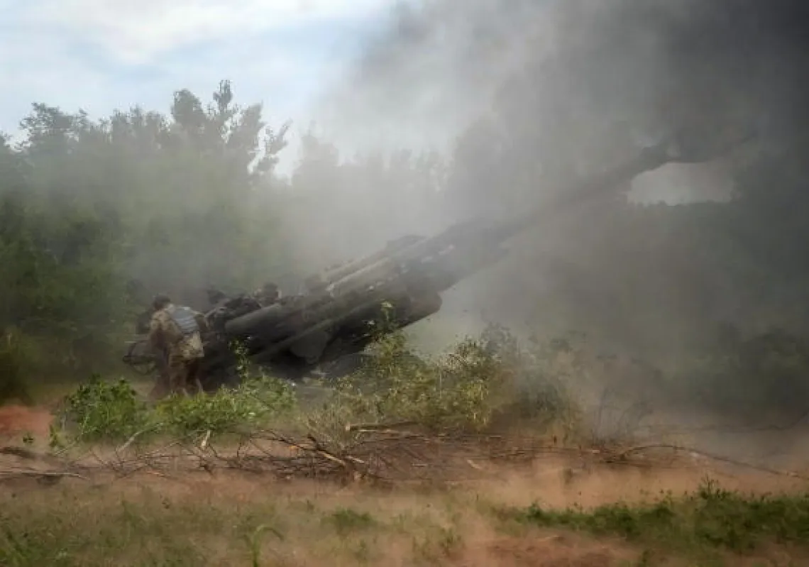 Ukrainian soldiers fire at Russian positions from a U.S.-supplied M777 howitzer in Ukraine's eastern Donetsk region Saturday, June 18, 2022. (AP Photo/Efrem Lukatsky, File)