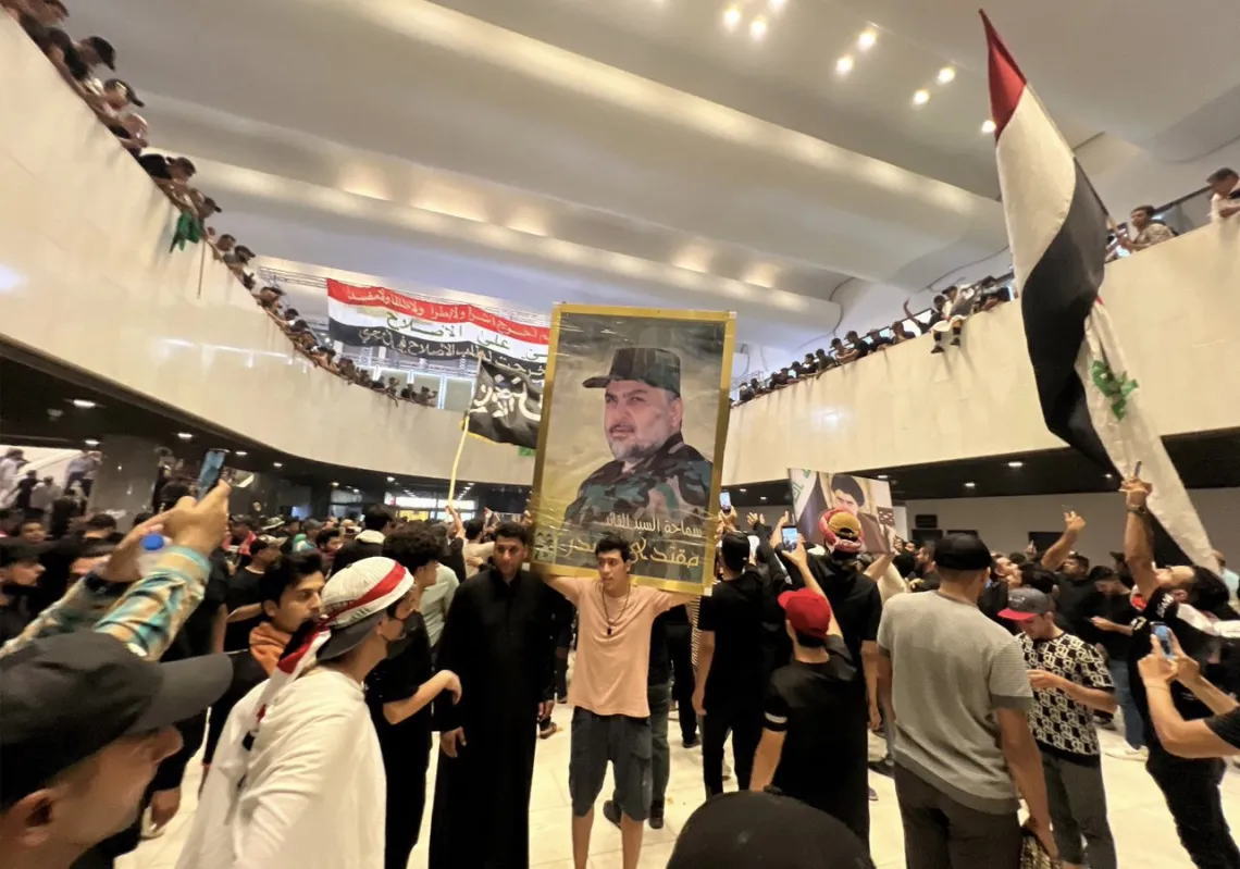 Hundreds of protesters have breached a high-security zone in Baghdad and broken into Iraq's parliament building.
