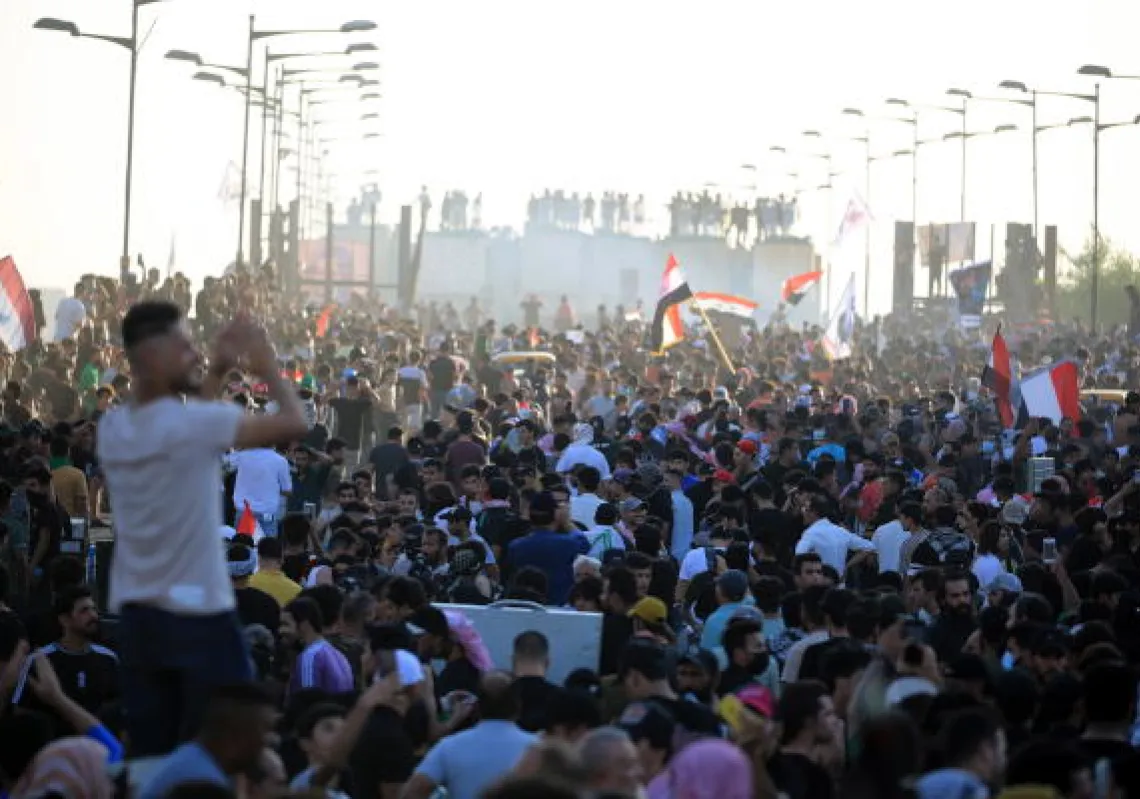 أثناء مظاهرة بغداد اليوم (إ.ب.أ)
