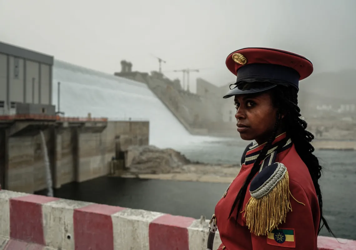 A member of the Republican March Band poses for photo before at the ceremony for the inaugural energy production at the Grand Ethiopian Renaissance Dam (GERD) in Guba, Ethiopia, on February 20, 2022.