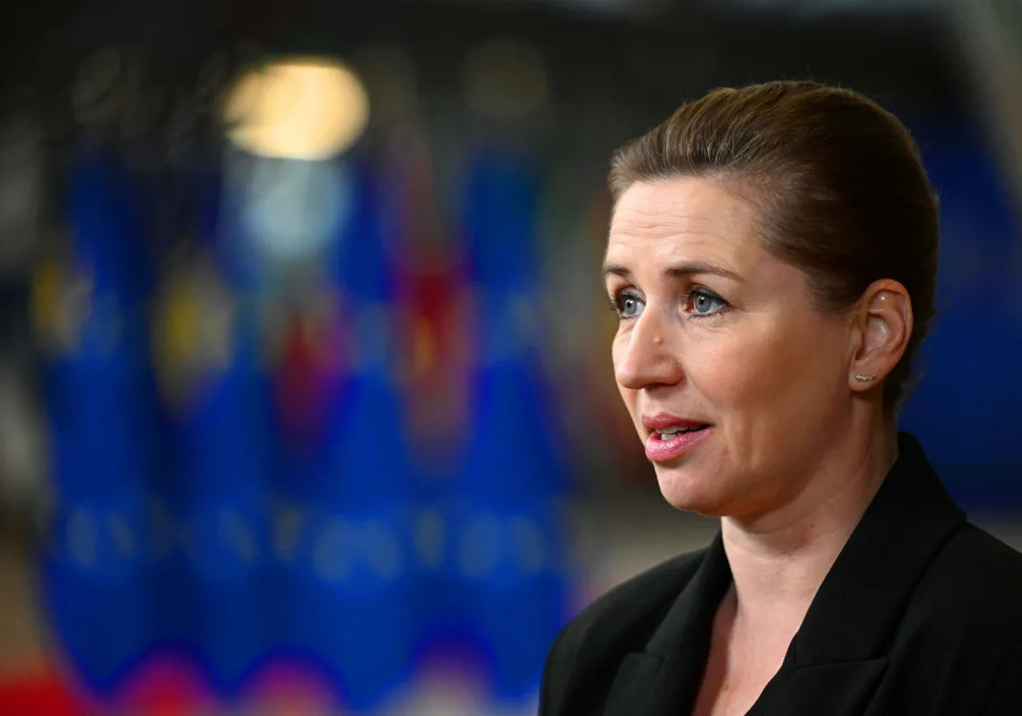 Denmark's Prime Minister Mette Frederiksen talks to the media as she arrives at the European headquarters for the EU-Western Balkans summit, in Brussels, on December 14, 2023. 