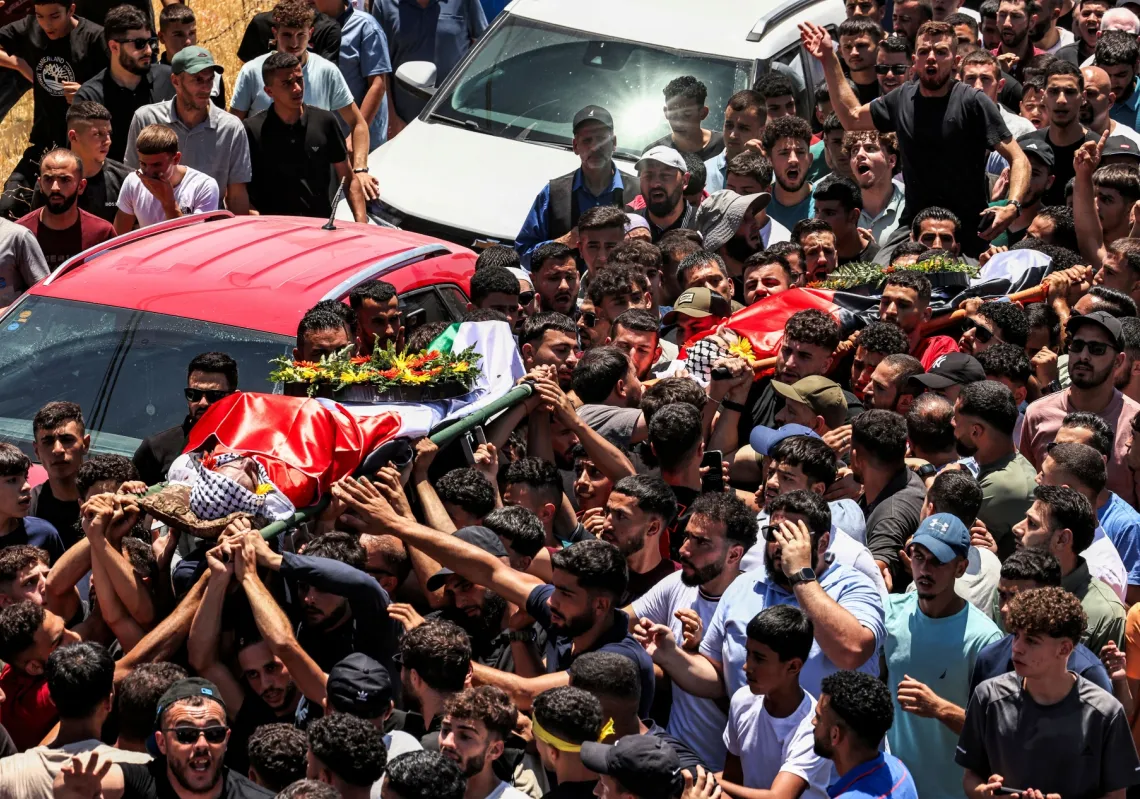 تشييع جنازة سيف الدين المسلط ومحمد الشلبي اللذين قتلهما المستوطنون الاسرائيليون في 13 يوليو في بلدة المزرعة الشرقية